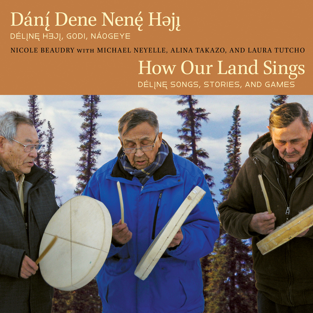 Three Délı̨nę Elders, Charlie Neyelle, Alfred Taniton, and Leon Modeste, drum, sing, and pray for Kǫ́gha ts'eredı (Feed-the-Fire ceremony) held at the beginning of the multi-community Edzi (or Hand-Game) Tournament, in February 2016. In front of them, a bonfire will receive offerings from each participant as a mark of respect for the land they are standing on to ensure the success of this three-day event. 